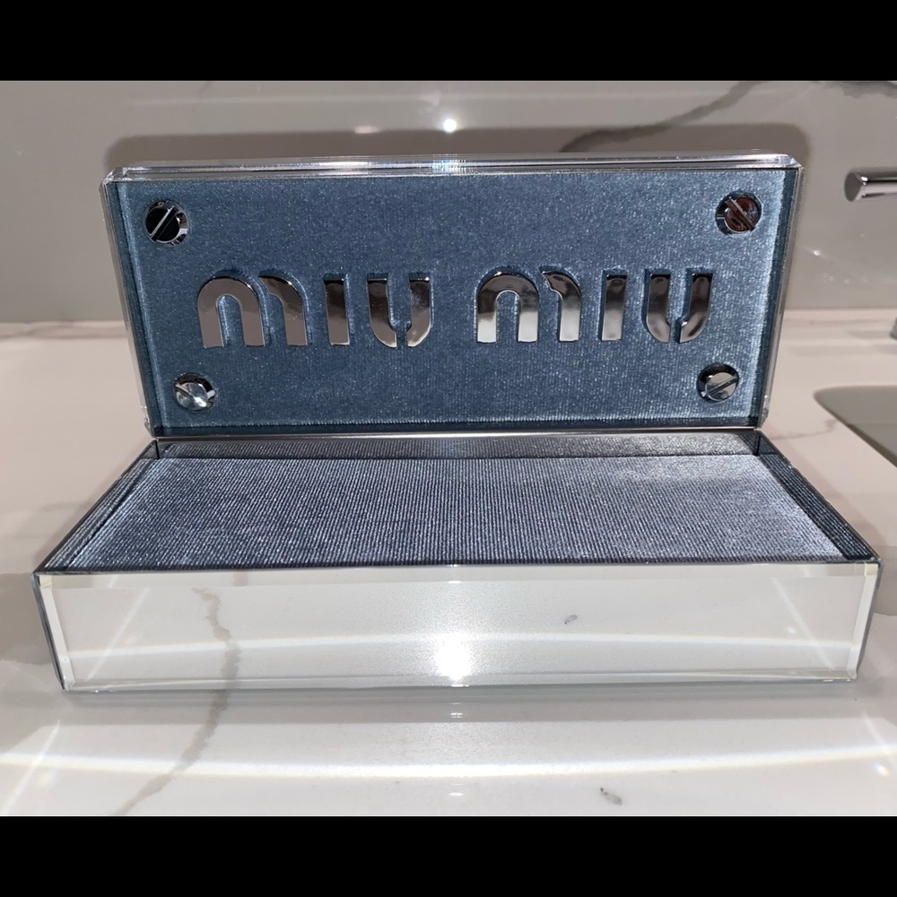 Miu Miu Glass and Velvet Display